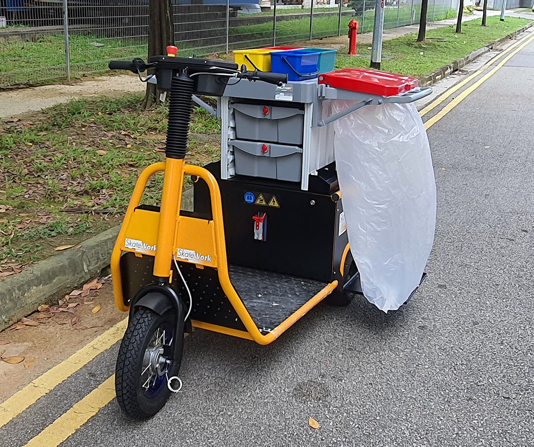 Electric Utility Vehicle with Cleaning Kit
